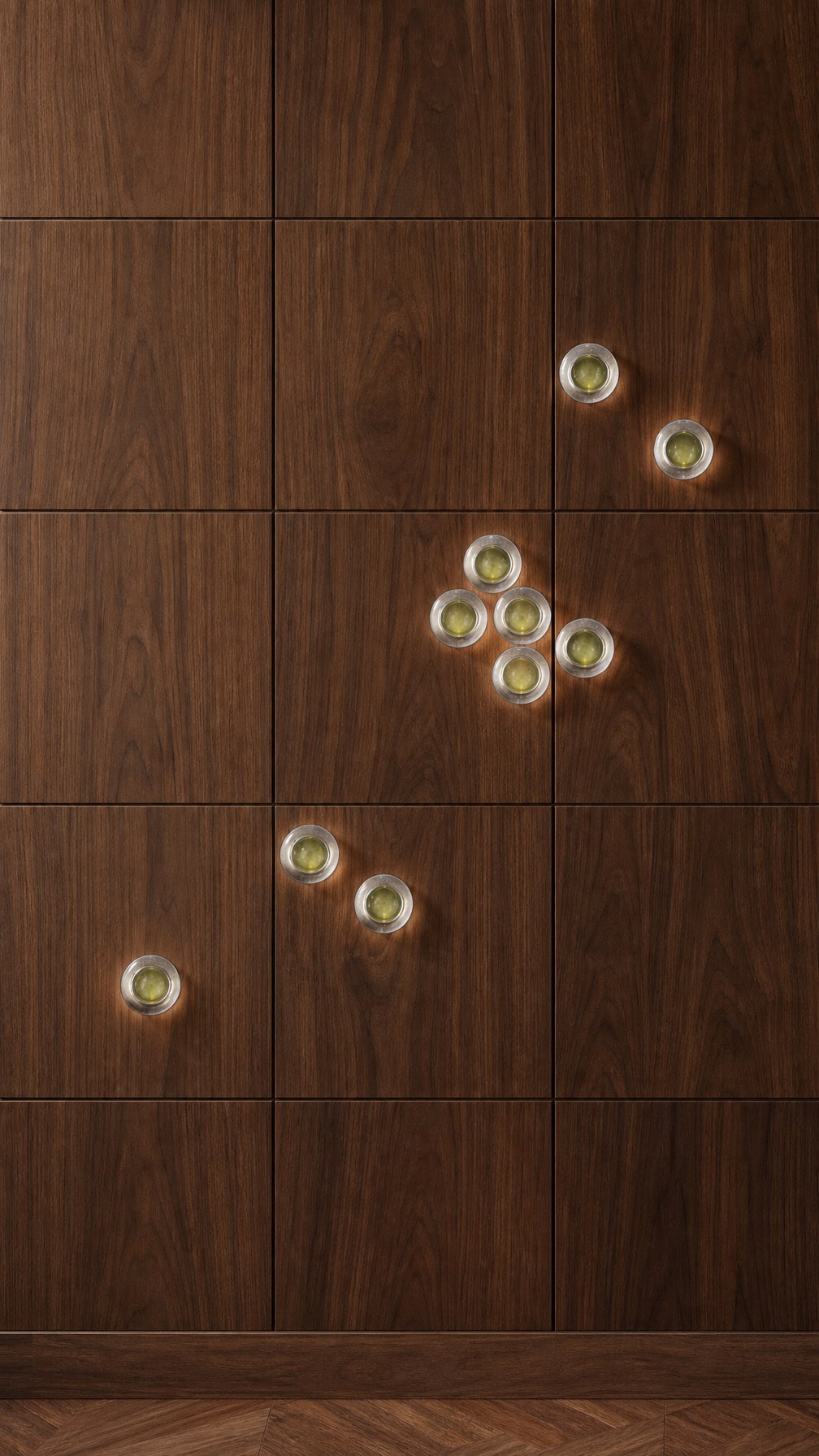 Balano Sconces scattered across a walnut wall, lit warm at the rim
